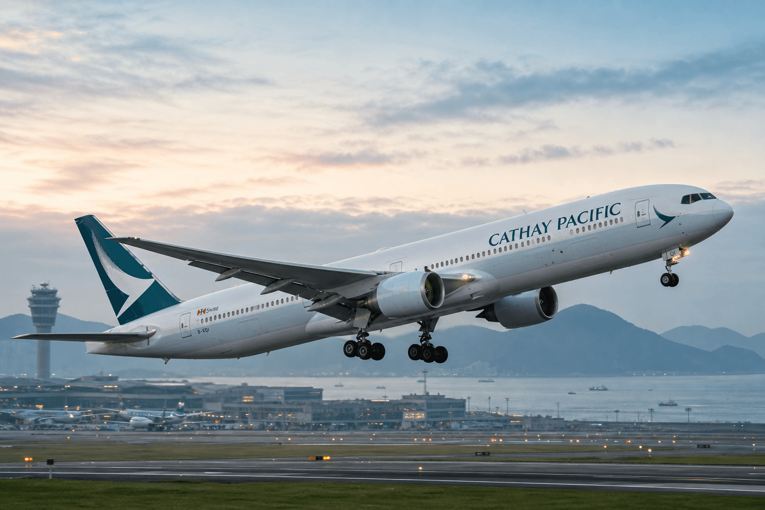 Cathay Pacific aircraft taking off from an airport runway